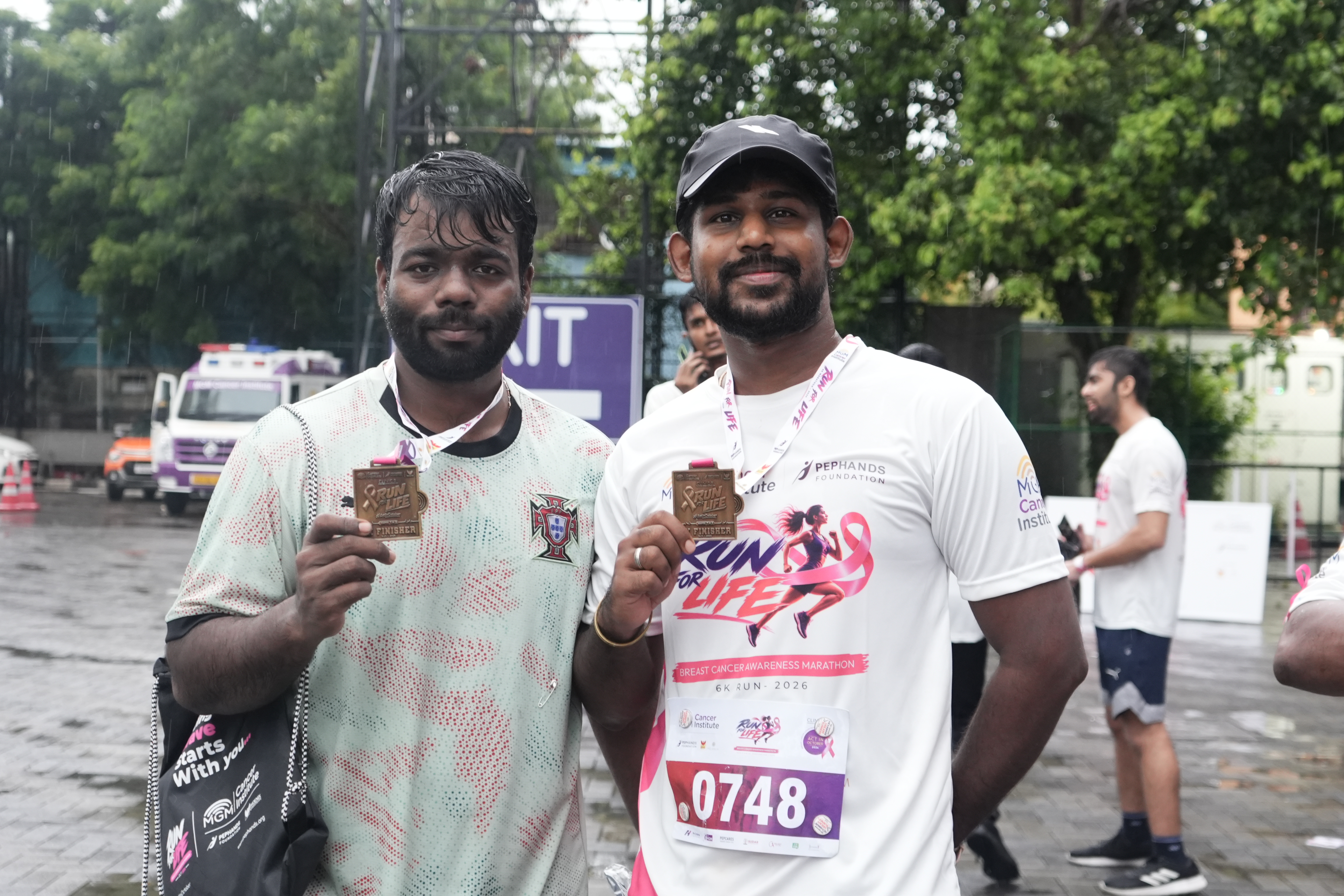 Proud Finishers Displaying Official Run For Life Medals